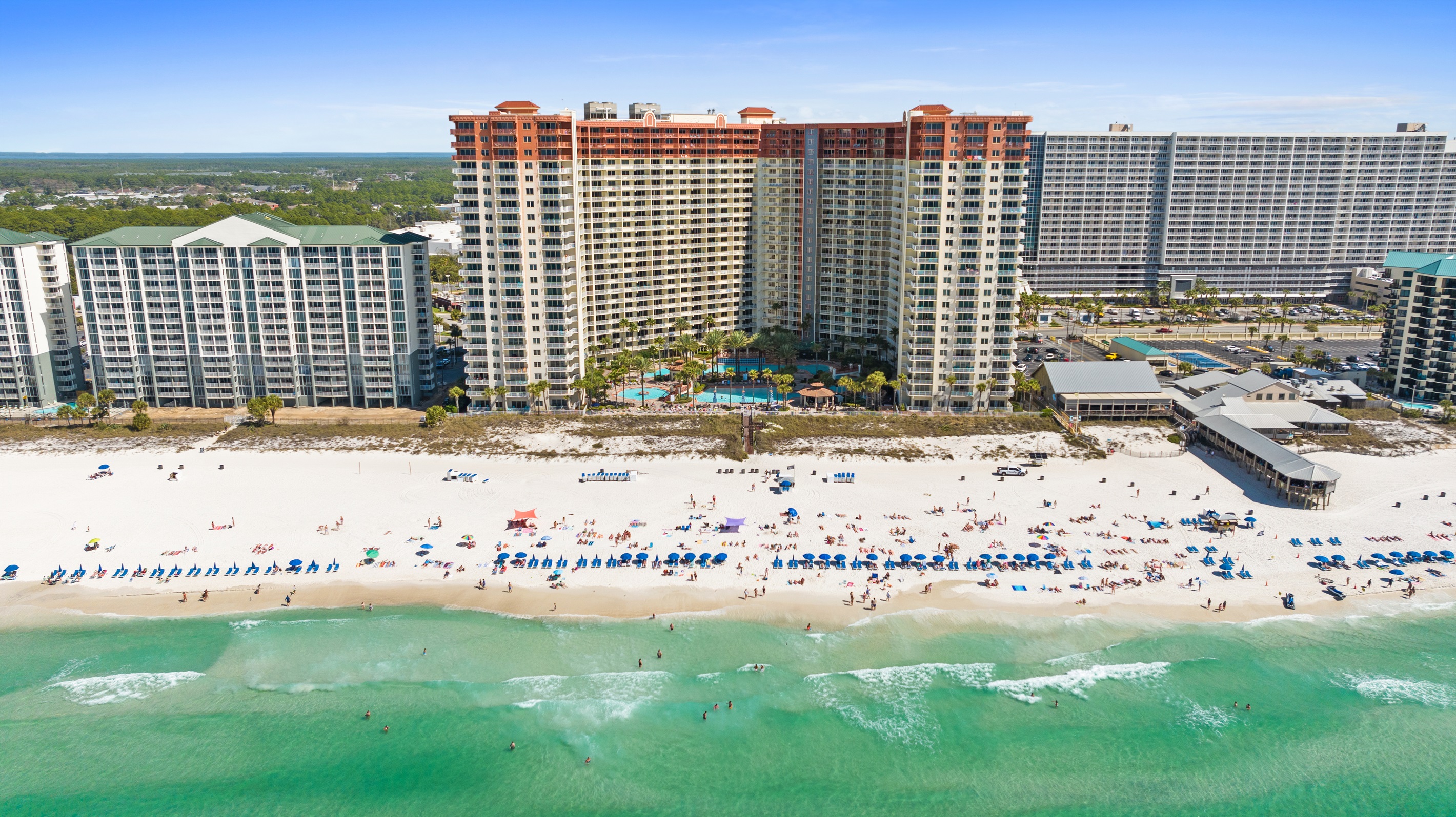 Happy guests enjoying our beautiful section of beach.