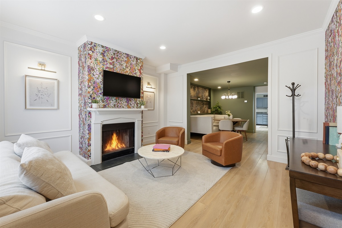 Open-concept living and dining spaces blend modern comfort with bold design accents for a uniquely memorable stay
