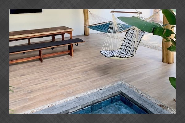 Lounging pool extends into Grand Cabana.  