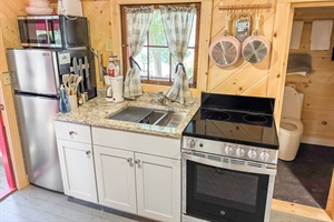 Fully equipped, electric cooktop stove, mini fridge, microwave, drip coffee maker, cooking basics, dishware, utensils