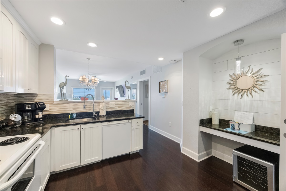 Kitchen fully stocked with cooking/eating/drinking utensils