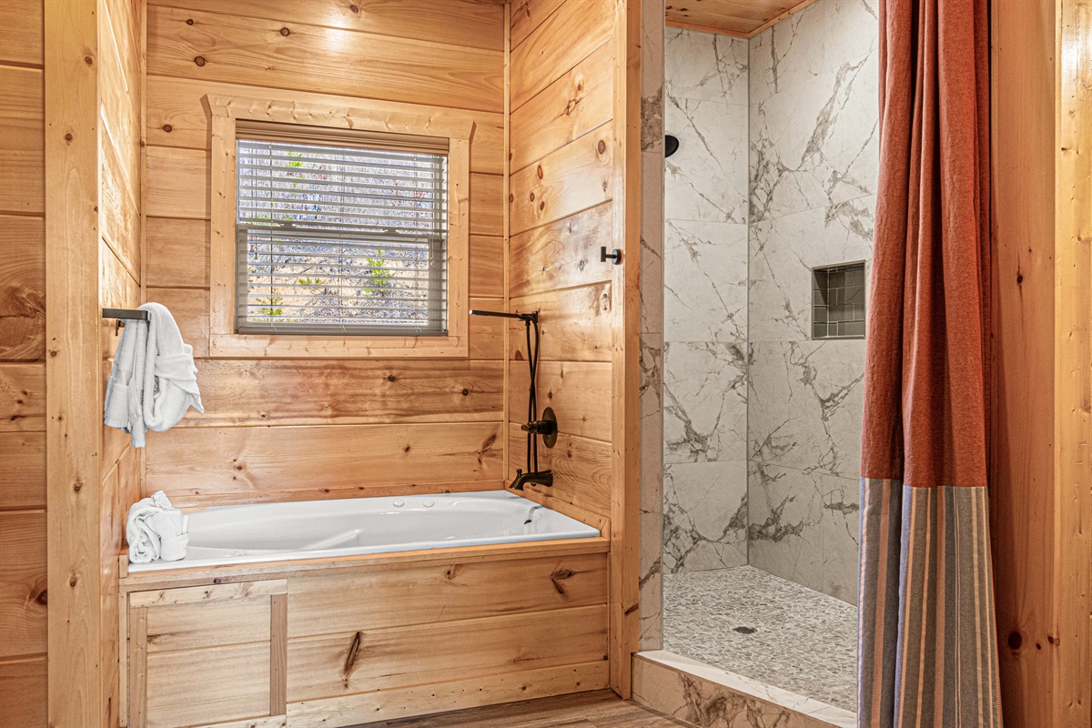 Soaker tub or huge walk in shower offer a little bit of fun for everyone - don't tell the kids!