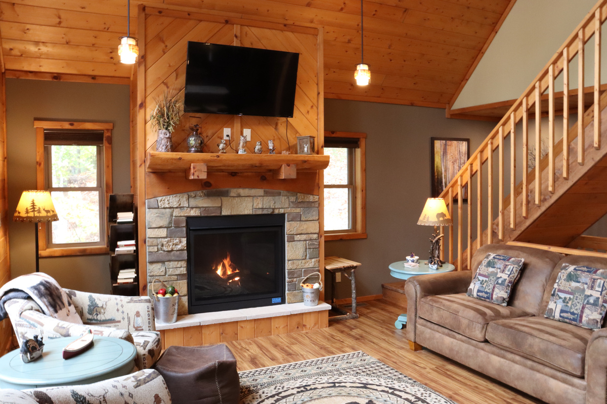 Living Room - 2 Sofas, 2 Swivel Rocker Chairs, Fireplace & 49" Smart TV (on Main Level)