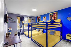 Fun and playful bunk bed room with colorful decor, perfect for kids and sleepovers.