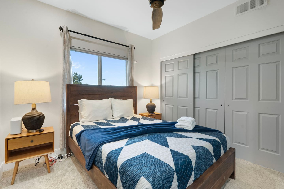 A restful retreat with natural light and ample storage.