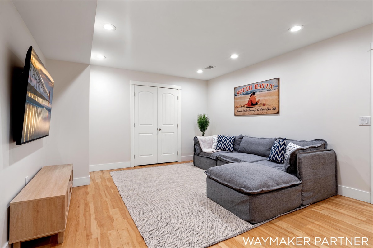 Cozy up and watch a movie on our 65 inch smart TV.