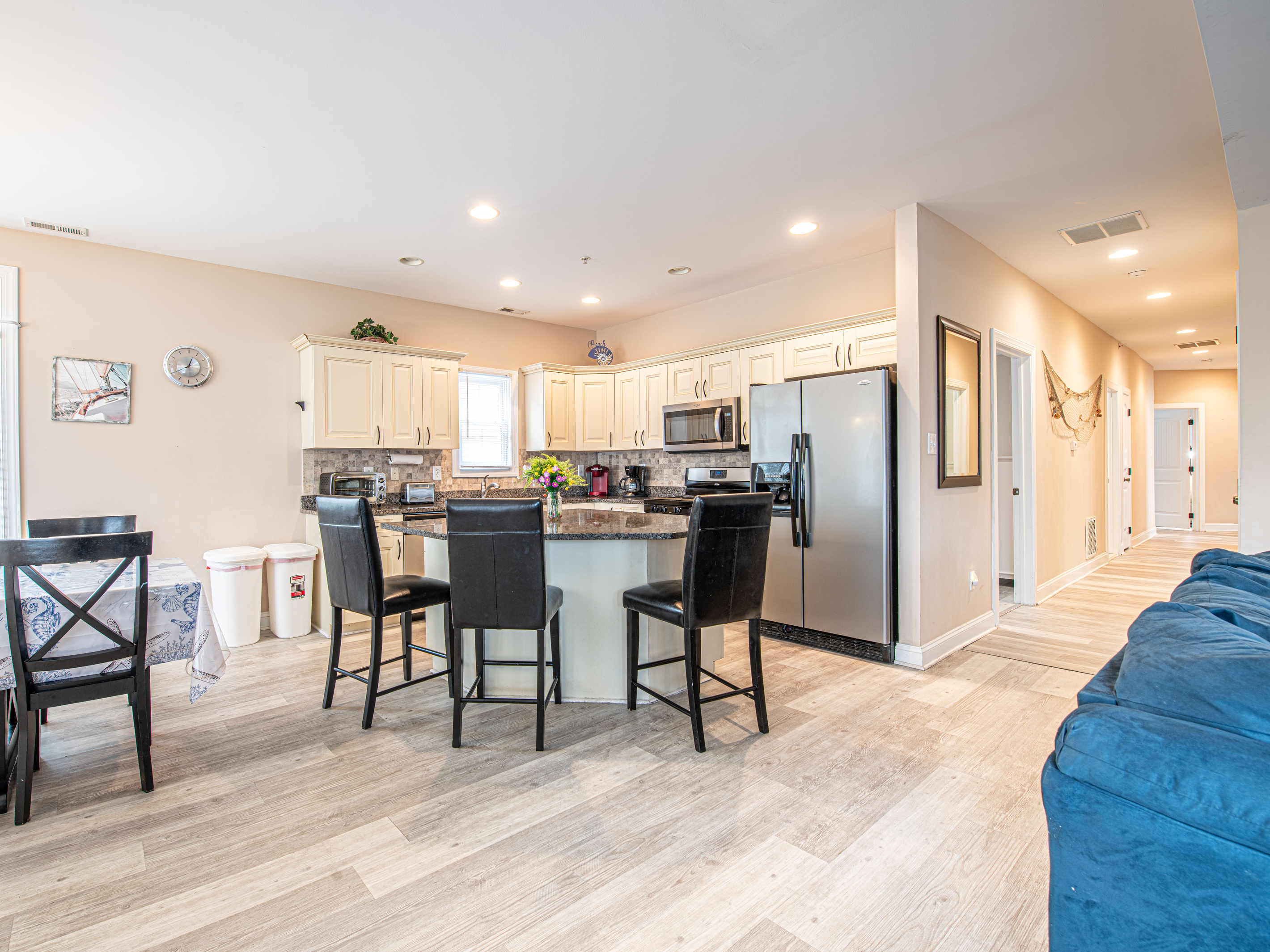 Kitchen Island, Dining Area, and Living Room Corner