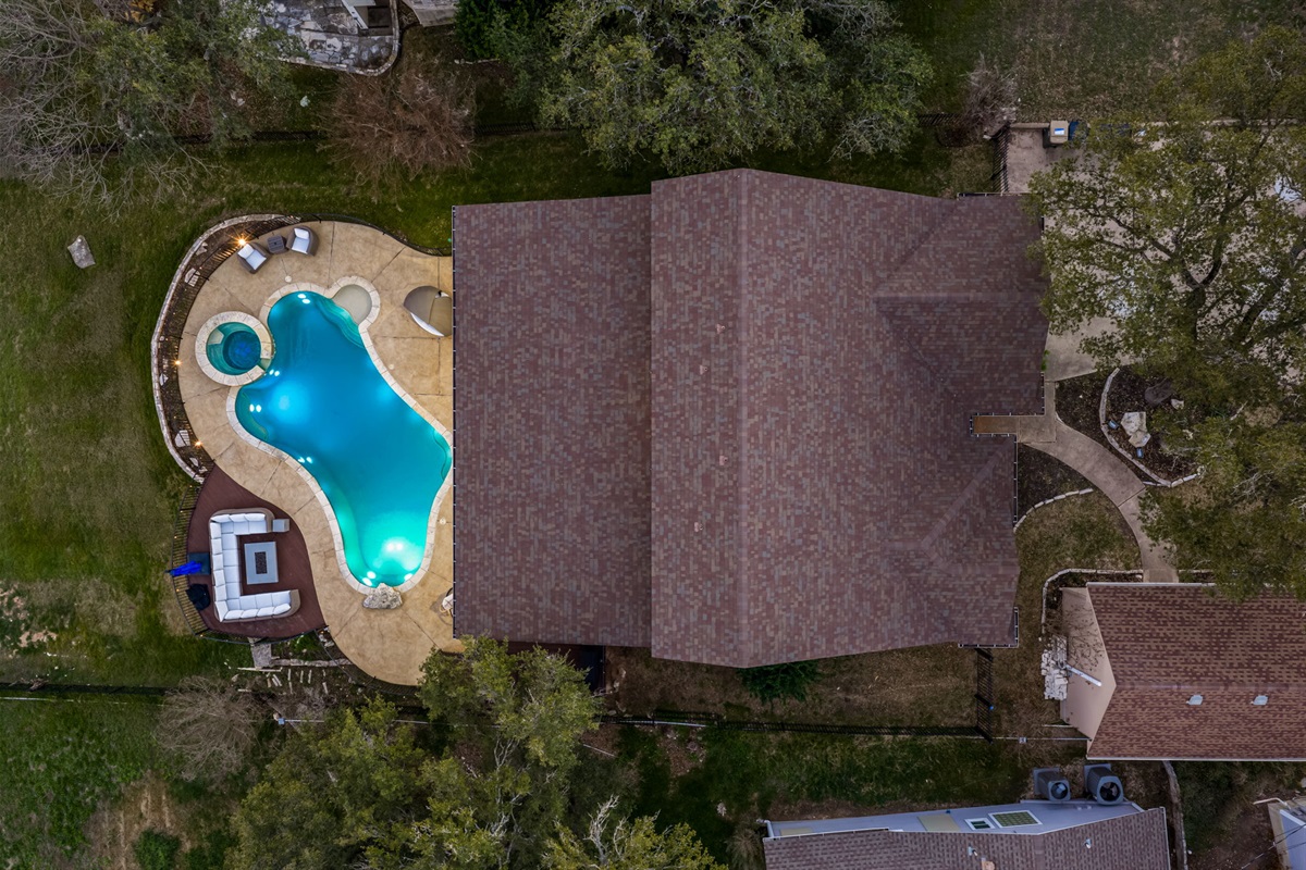 Top-down aerial of the property highlighting the private pool and layout.