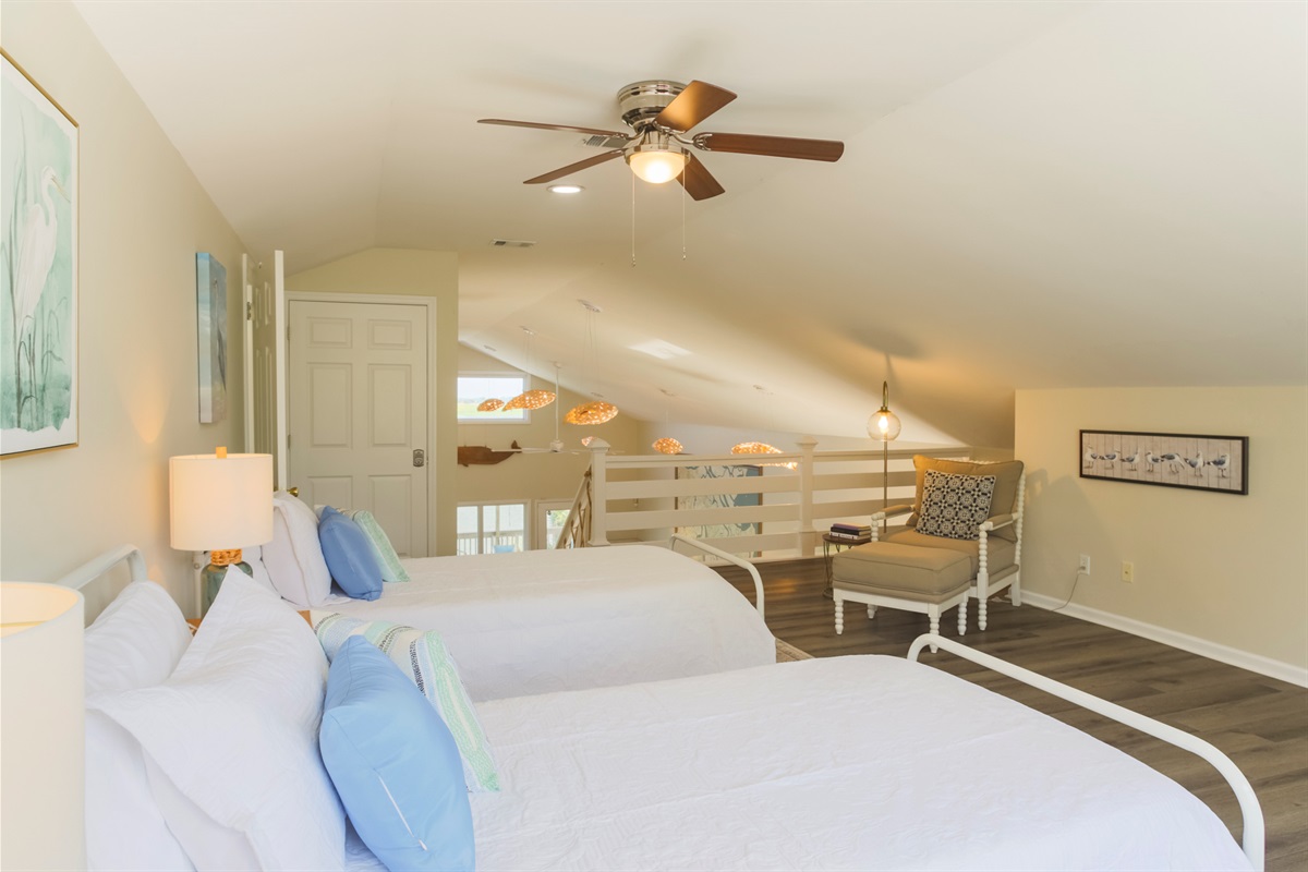 Bright and inviting sleeping space with thoughtful details for comfort.
