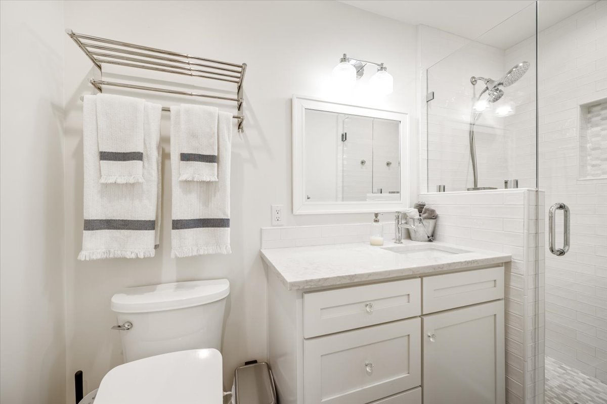 Bidet toilet, tasteful clean hall bathroom 