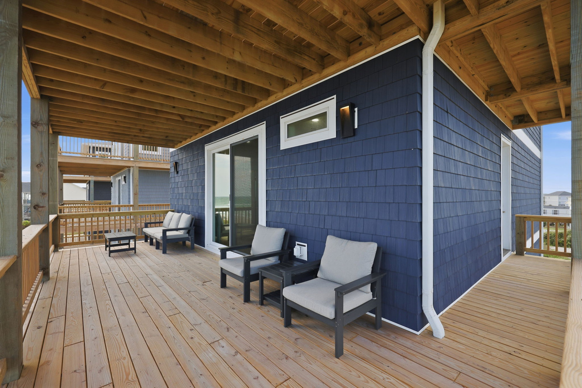 Private pool area with surrounding deck and lounge chairs