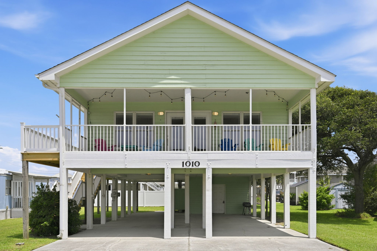 My 4 Beaches: an elevated beach home with covered parking, spacious outdoor areas, and easy access to the beach