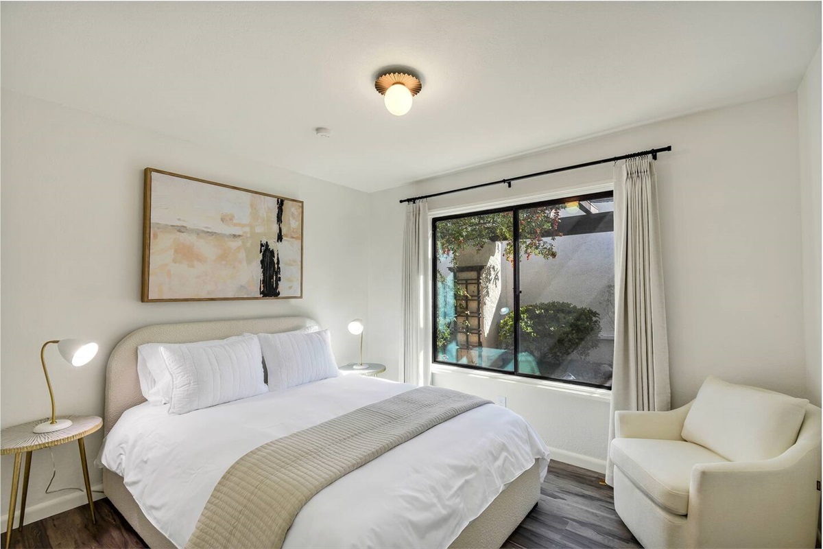 Queen bed in the guest bedroom. Located directly across from the hall bathroom.