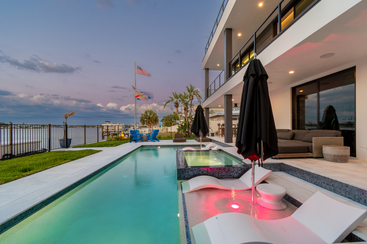 Day or night enjoy the Modern yet serene outdoor space of La Hacienda