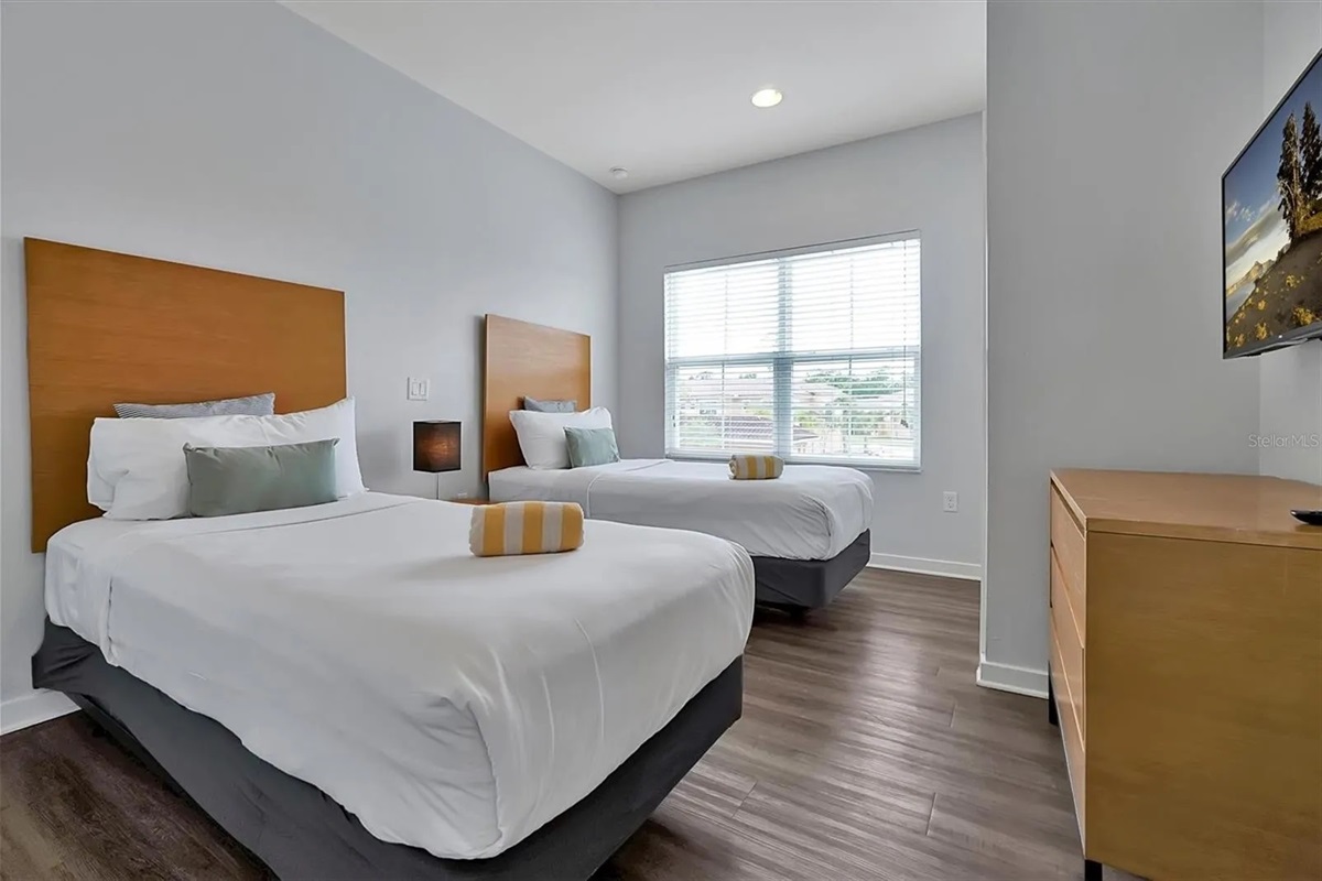 Third bedroom with two beds