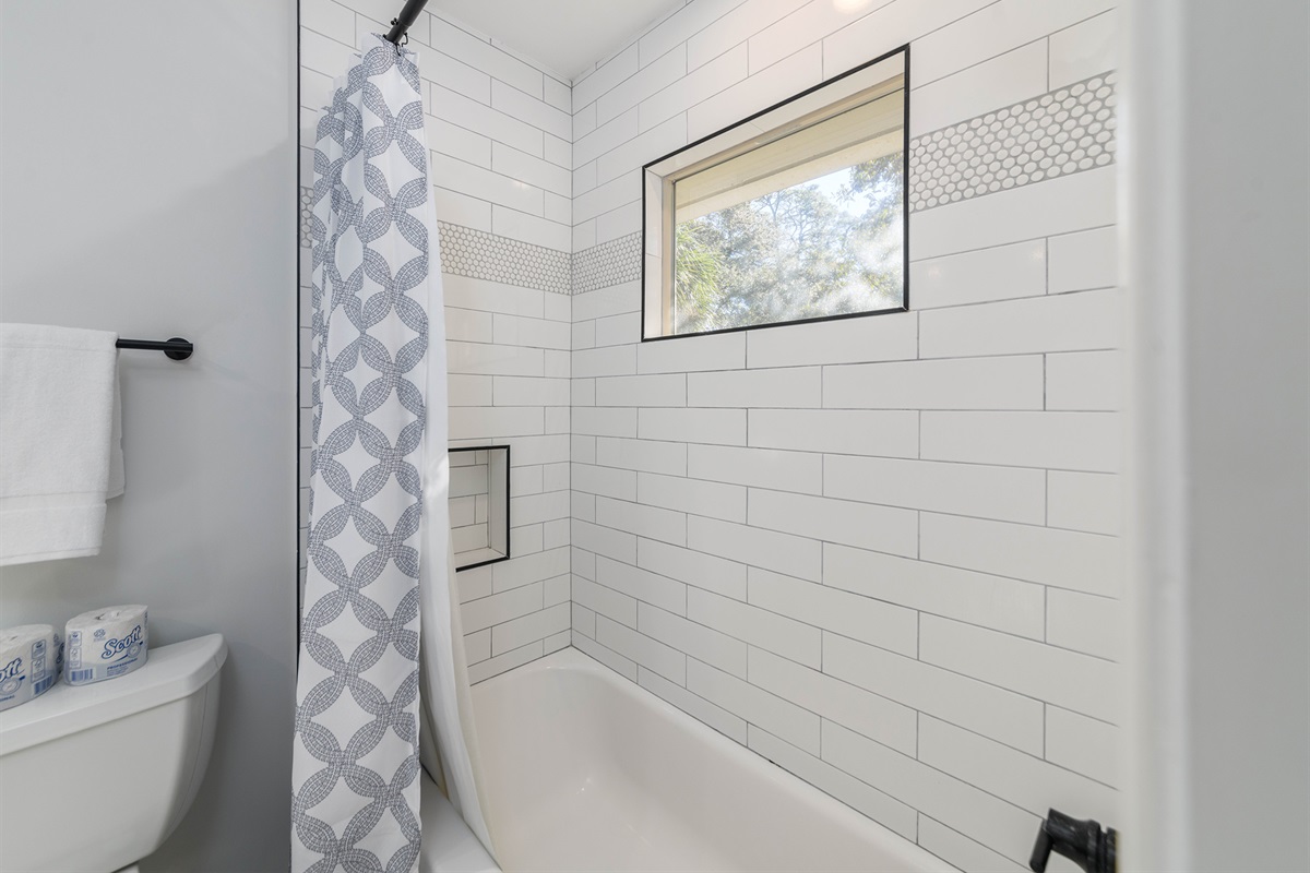 Tub shower for 3rd bedroom with plenty of natural light