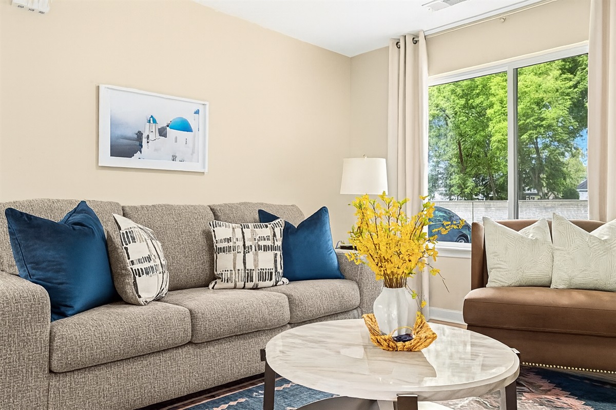 Relax in our inviting lounge space, furnished with cozy seating and a smart TV to elevate your entertainment experience.