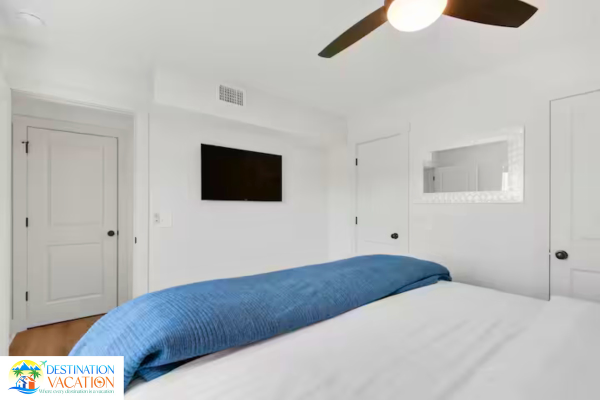 Cozy comfort awaits in this bright private bedroom.
