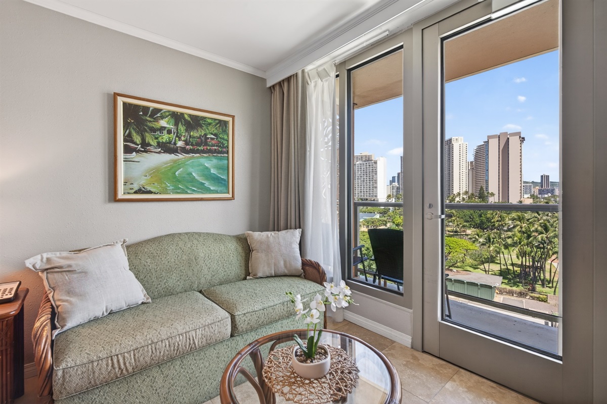 Queen sofa sleeper and direct access to private lanai with outdoor seating