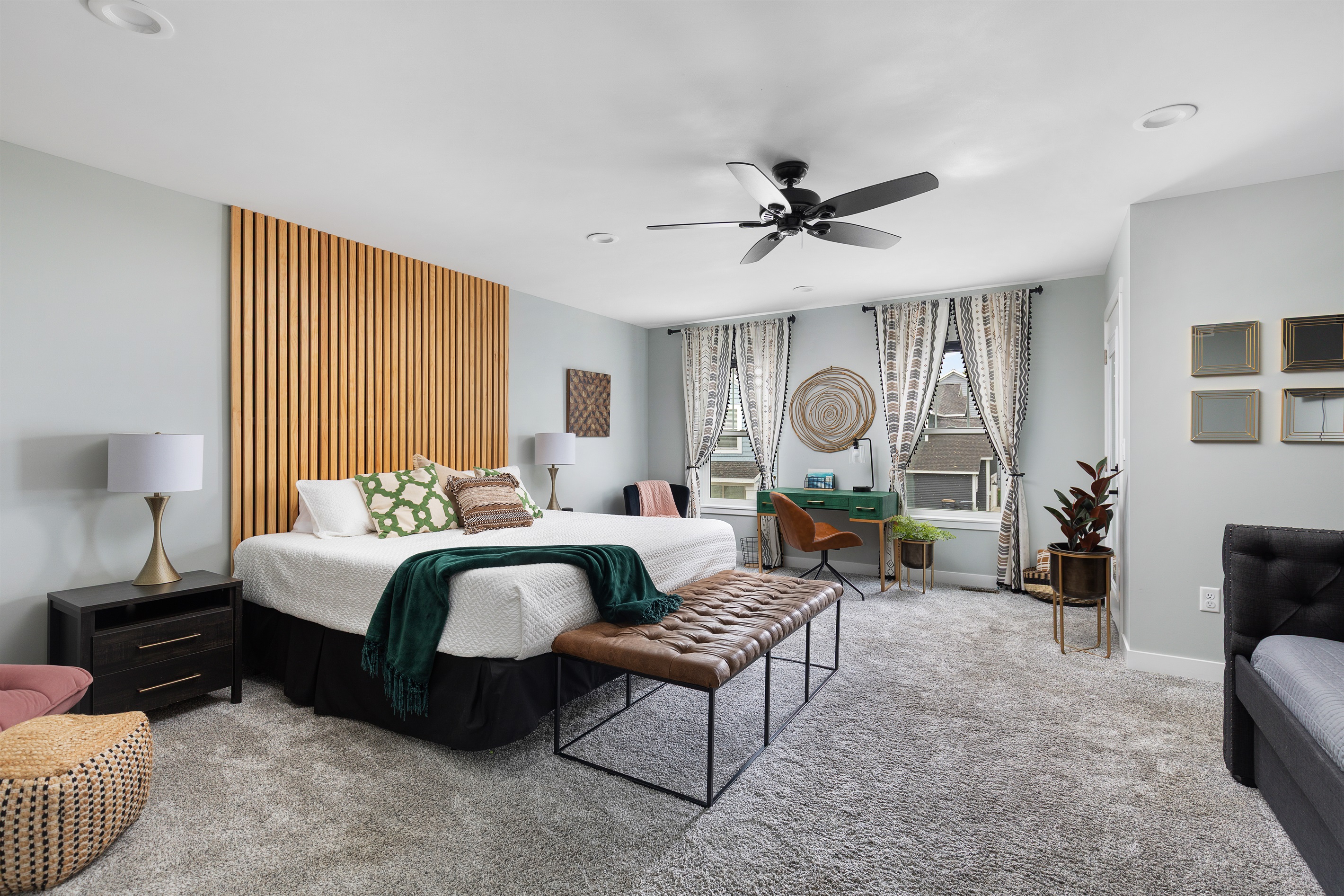 Primary bedroom, huge space, with king bed and day bed with trundle. Nice balcony off the room, attached to full bath