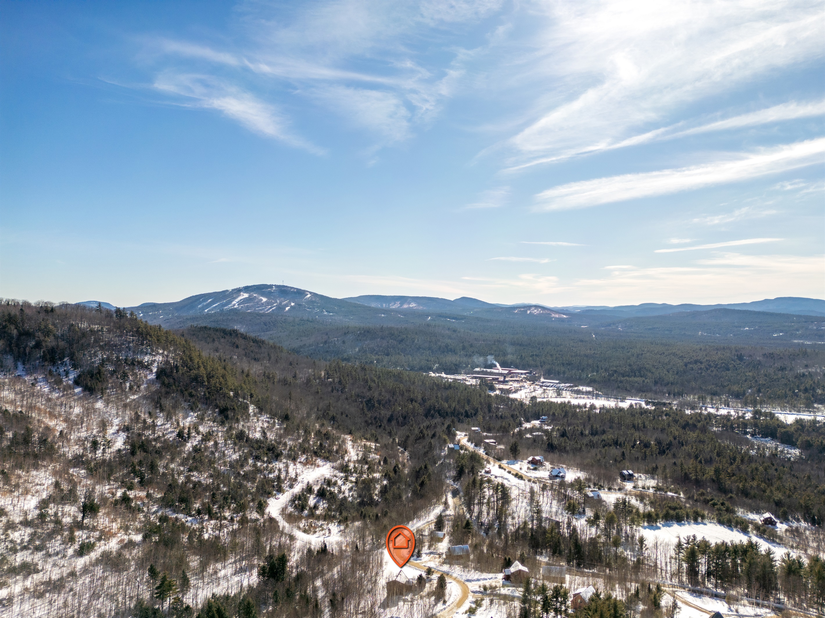 Capture the scale and charm of the home with an elevated view