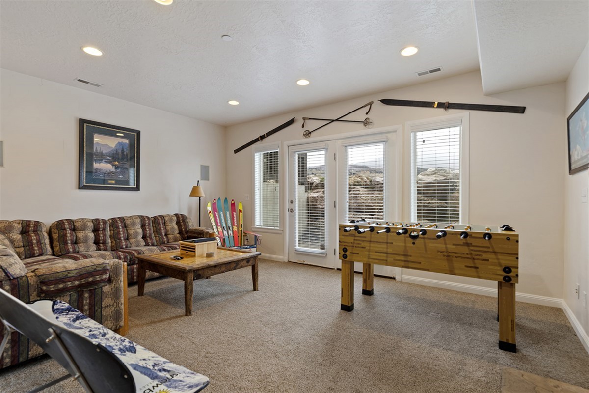 Spacious lower-level game room for fun and entertainment.