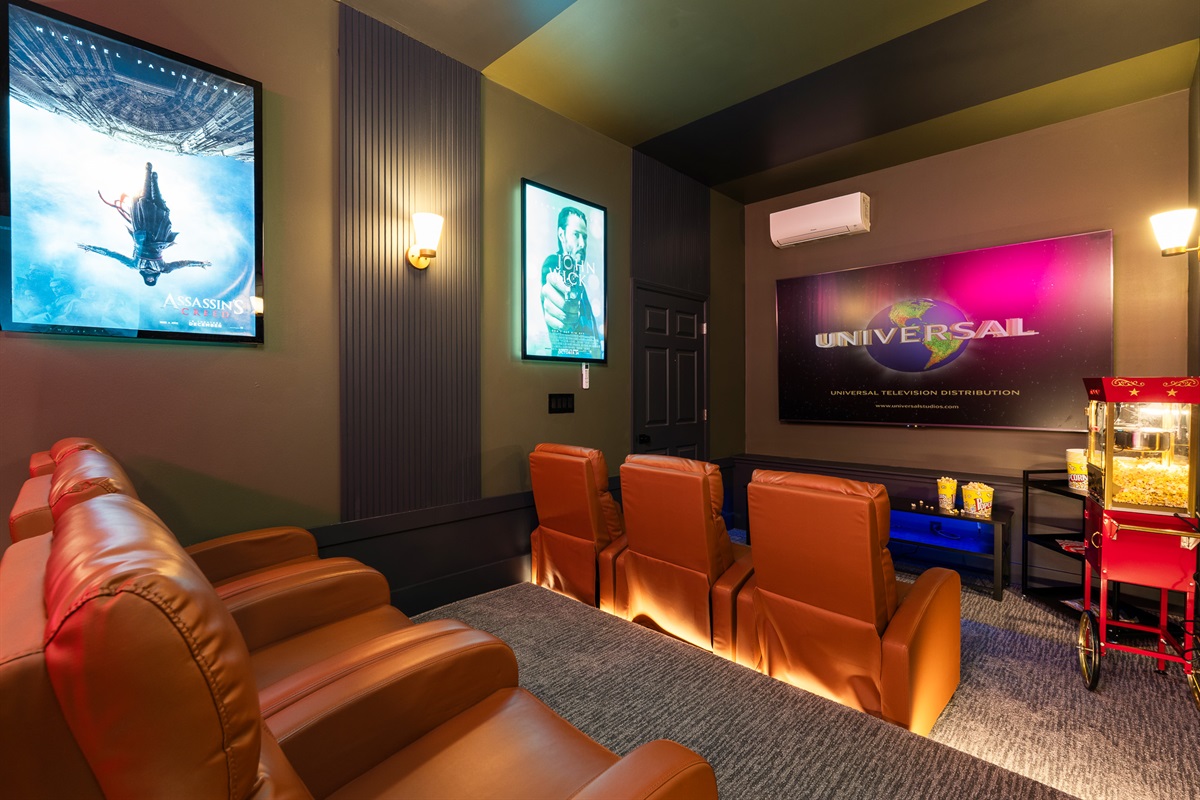 Private theatre room with plush seating - movie nights made easy after a day in downtown Asheville