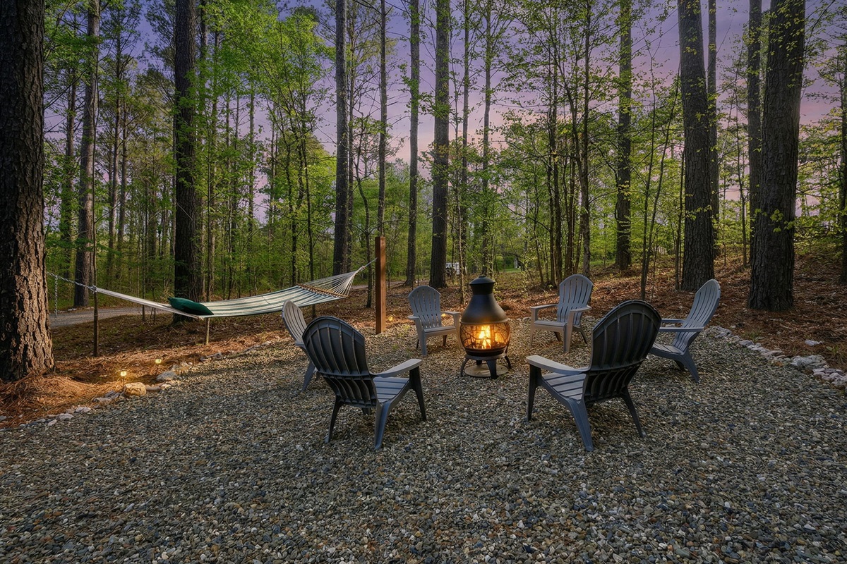 Front firepit area with hammock and star views.