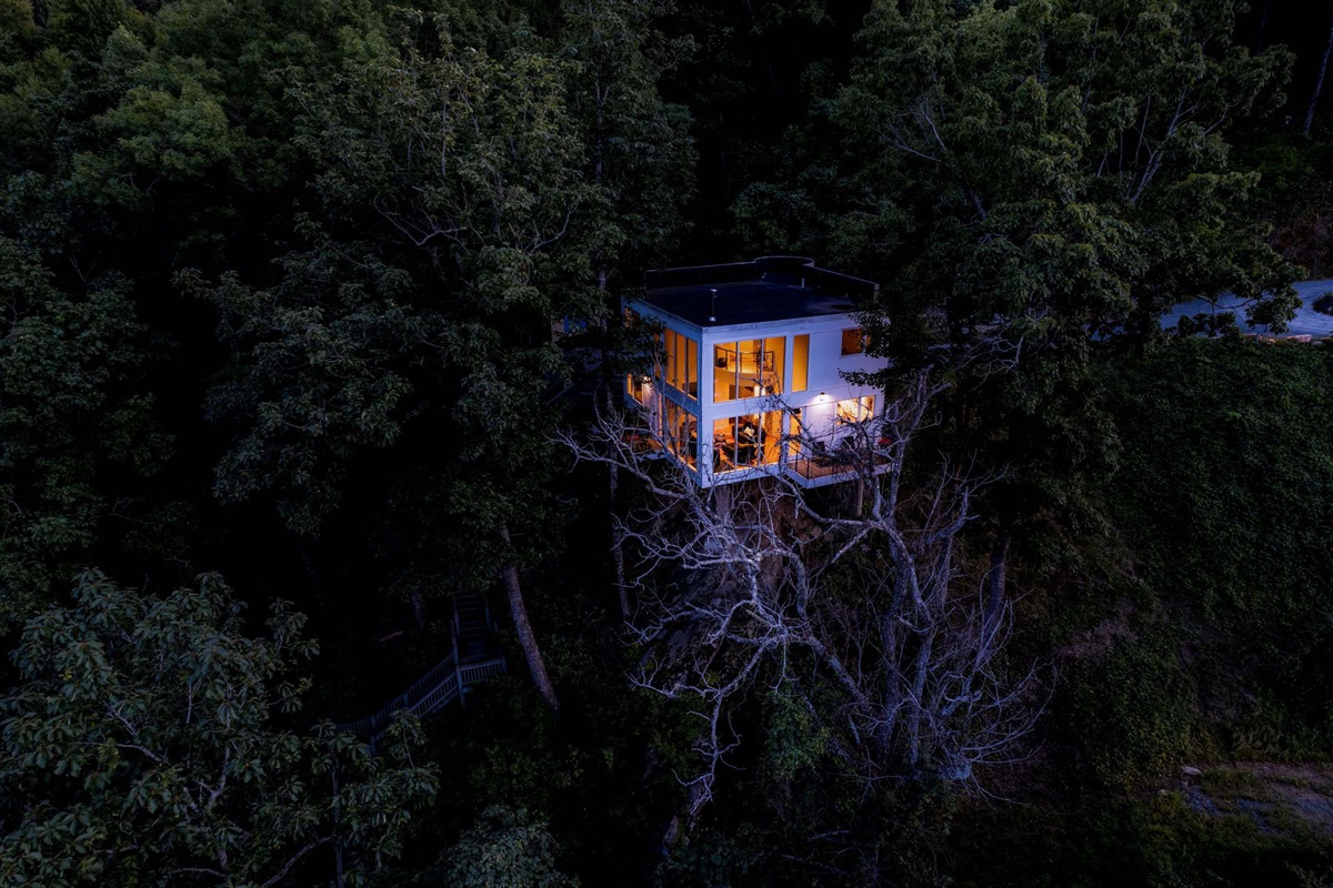 The tree house glows as darkness sets over the Smoky Mountains!
