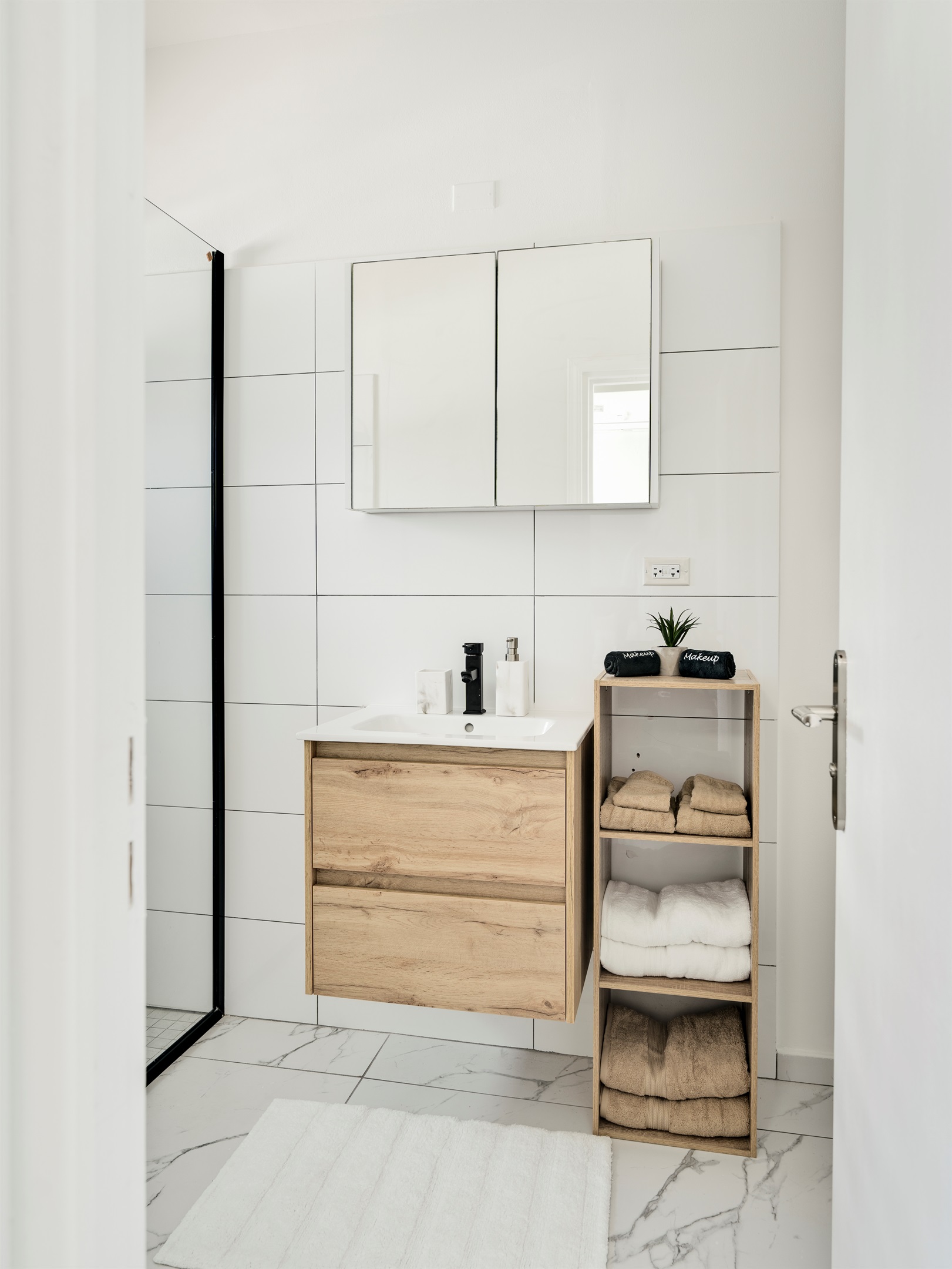 Compact Bathroom Vanity with Warm Wood Drawer & Sleek Sink