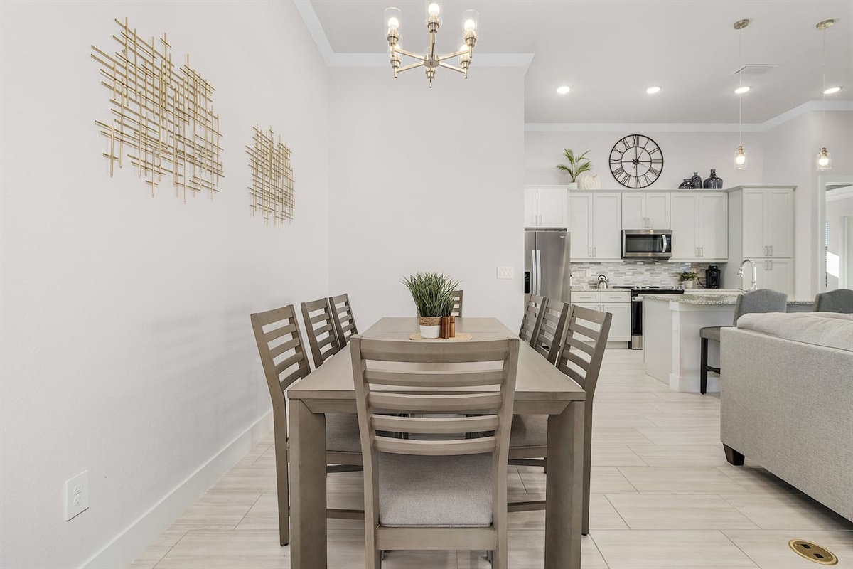 Large dining area accommodates up to 8 guests.