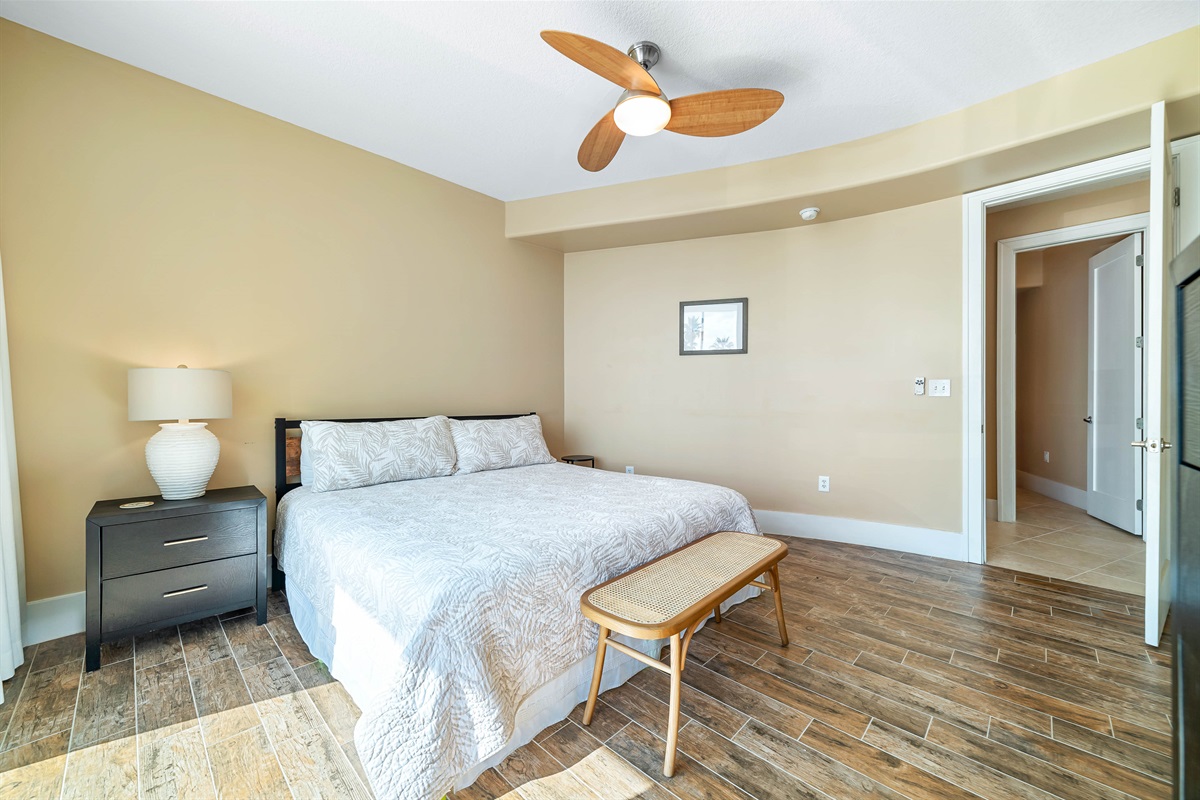 Thoughtful details and comfortable furnishings define this inviting guest room with king-size bed, creating a relaxing and enjoyable space.
