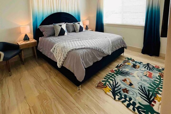 Our spacious king suite features an attached bath, walk in shower, double vanity, and walk in closet.  We also have TV in every bedroom for those relaxing days. 