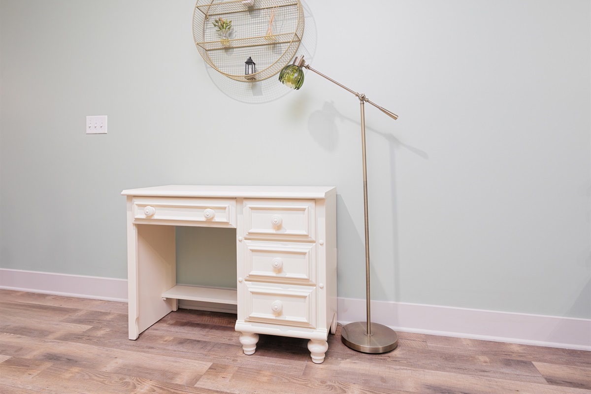 Dedicated workspace with desk, providing a functional and quiet area for remote work or extended stays.