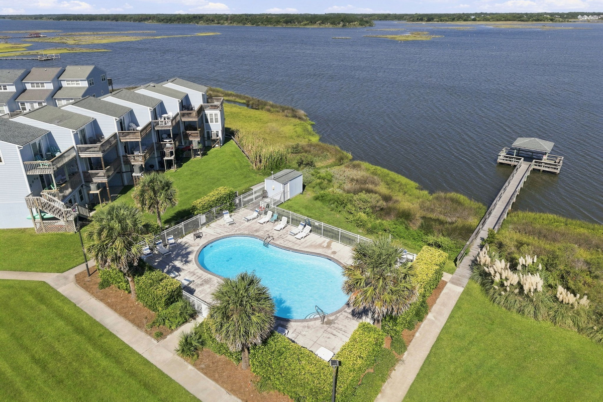 Enjoy the best of both worlds with a refreshing community pool and a private pier leading right out to the water.