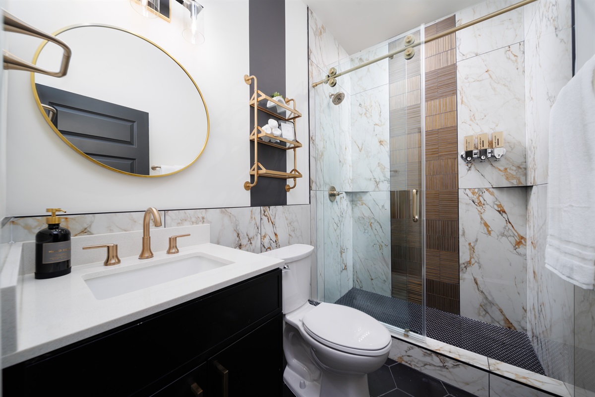 En-suite bathroom with walk in shower.