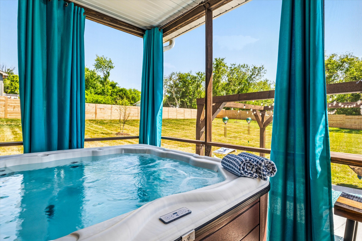 Slip into the hot tub and watch the sun set over the rolling countryside.