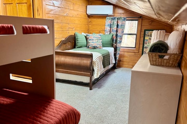 Designed with younger guests in mind, this inviting bunk room includes a twin-over-full bunk bed and additional twin trundle for sleepovers and family stays.