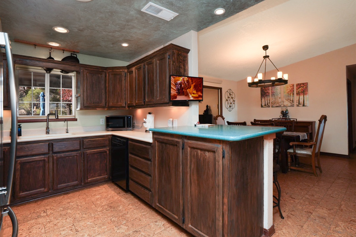 Kitchen bar seating for casual meals, morning coffee, or keeping the cook company while dinner comes together.