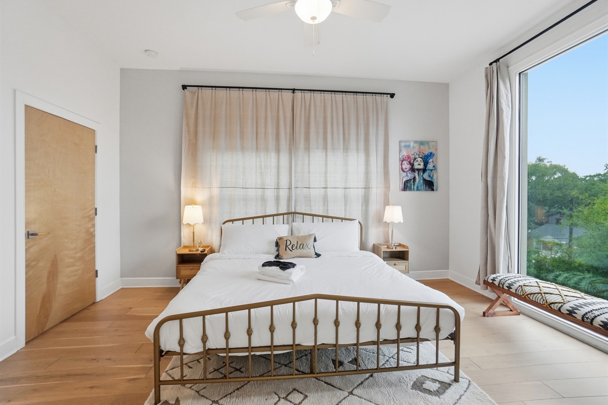Huge king bed in the top floor guest room with amazing views