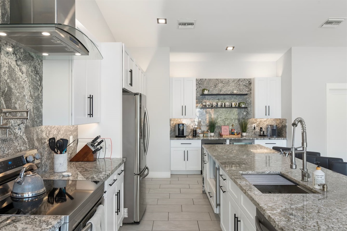 Well-stocked kitchen with premium finishes.

