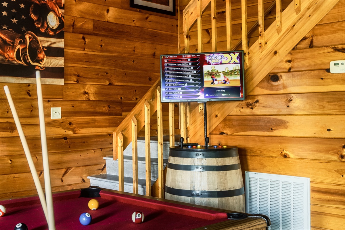 Challenge your family and friends to a game of pool or any of the 7,000 games on the multi-cade barrel arcade.