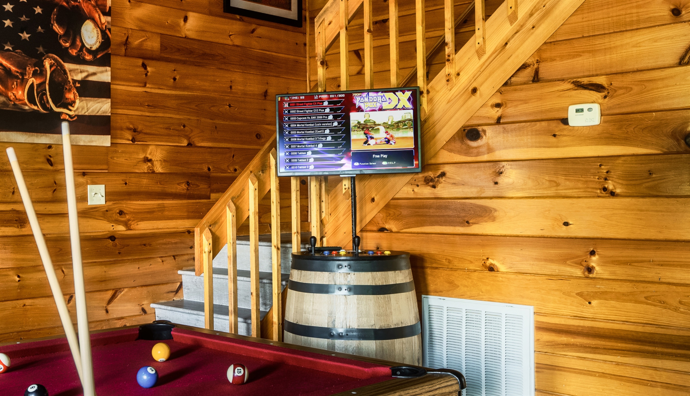 Challenge your family and friends to a game of pool or any of the 7,000 games on the multi-cade barrel arcade.