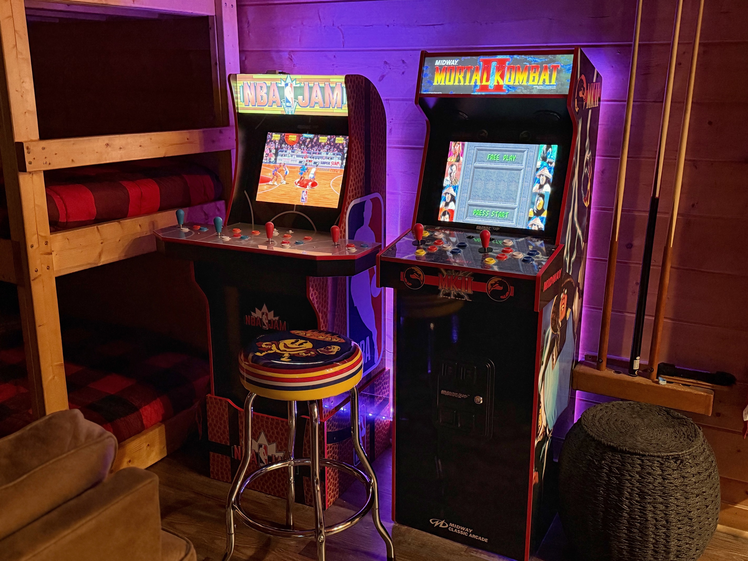 Game room fun: NBA Jam & Mortal Kombat arcades beside the bunk nook—kid-approved hangout.