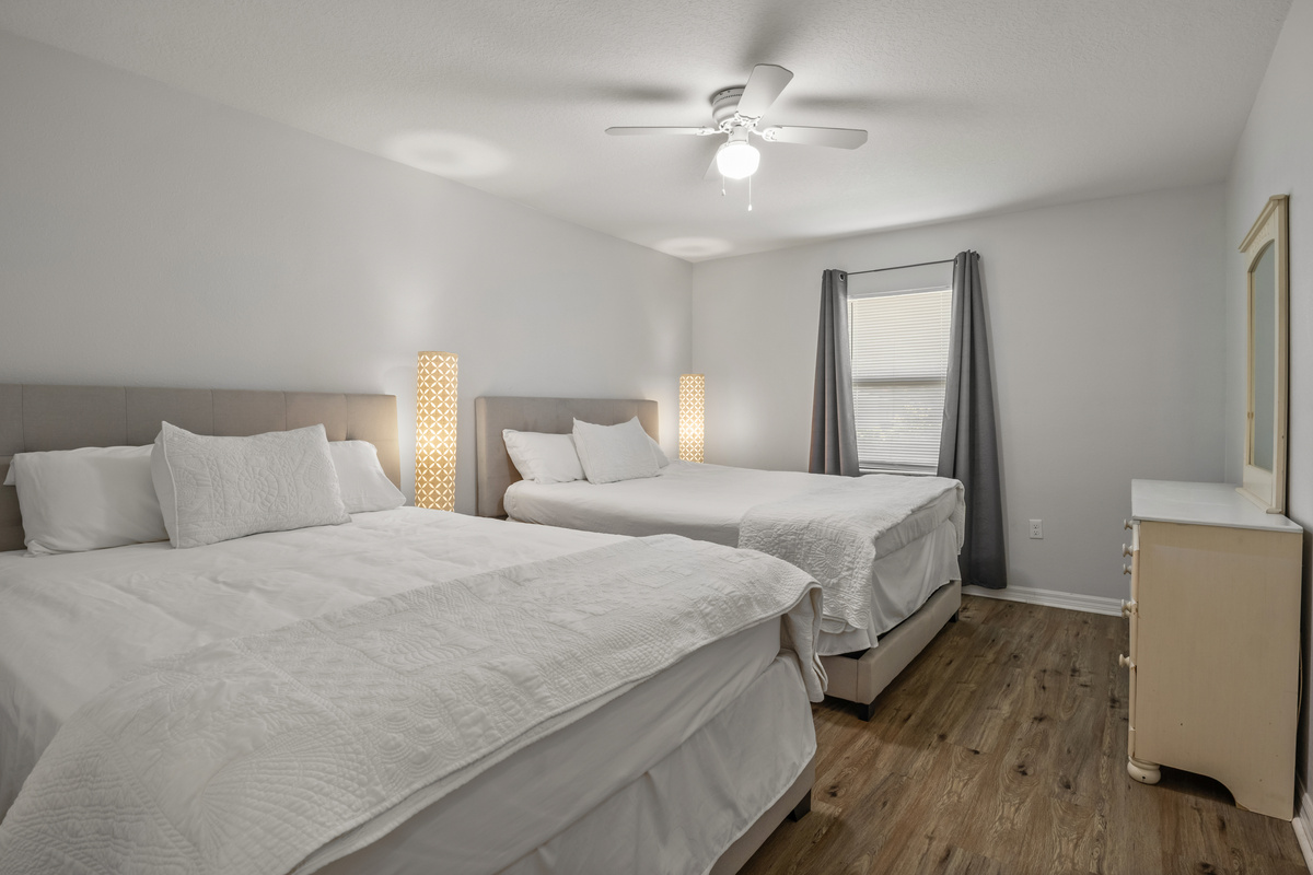 Bedroom 2 features two queen size beds. Natural Light.