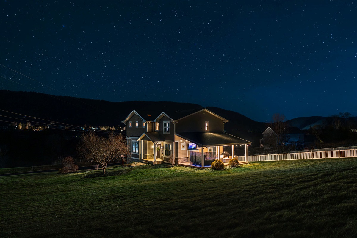 Peaceful nighttime setting with open views — quiet, private, and beautifully lit after dark.