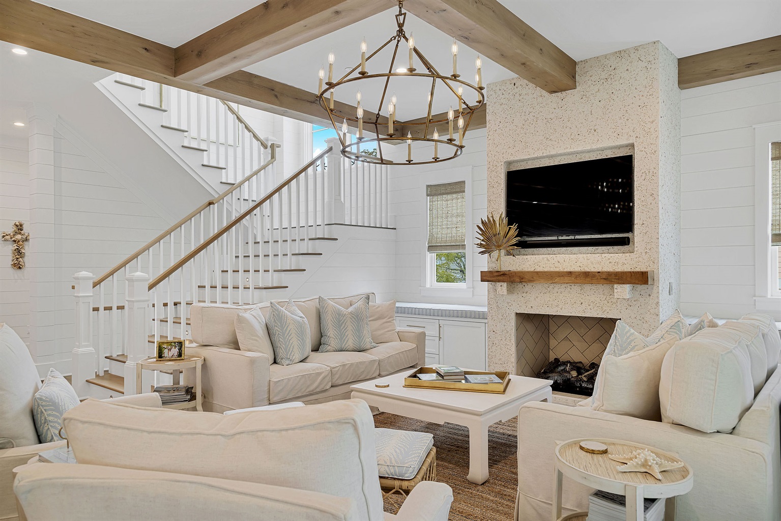 Relax in this beautiful living room, with a gas fireplace for cooler weather.