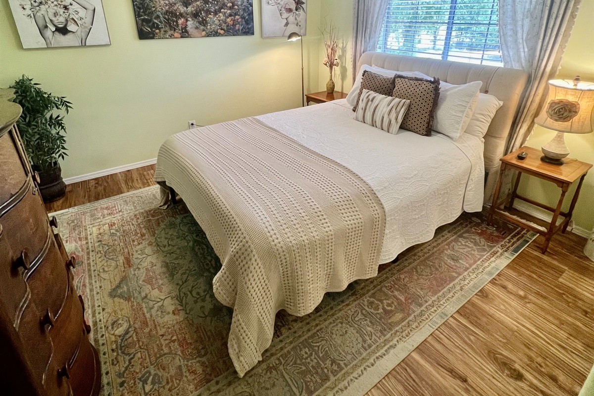 Plush Queen-sized bed with high quality textiles
