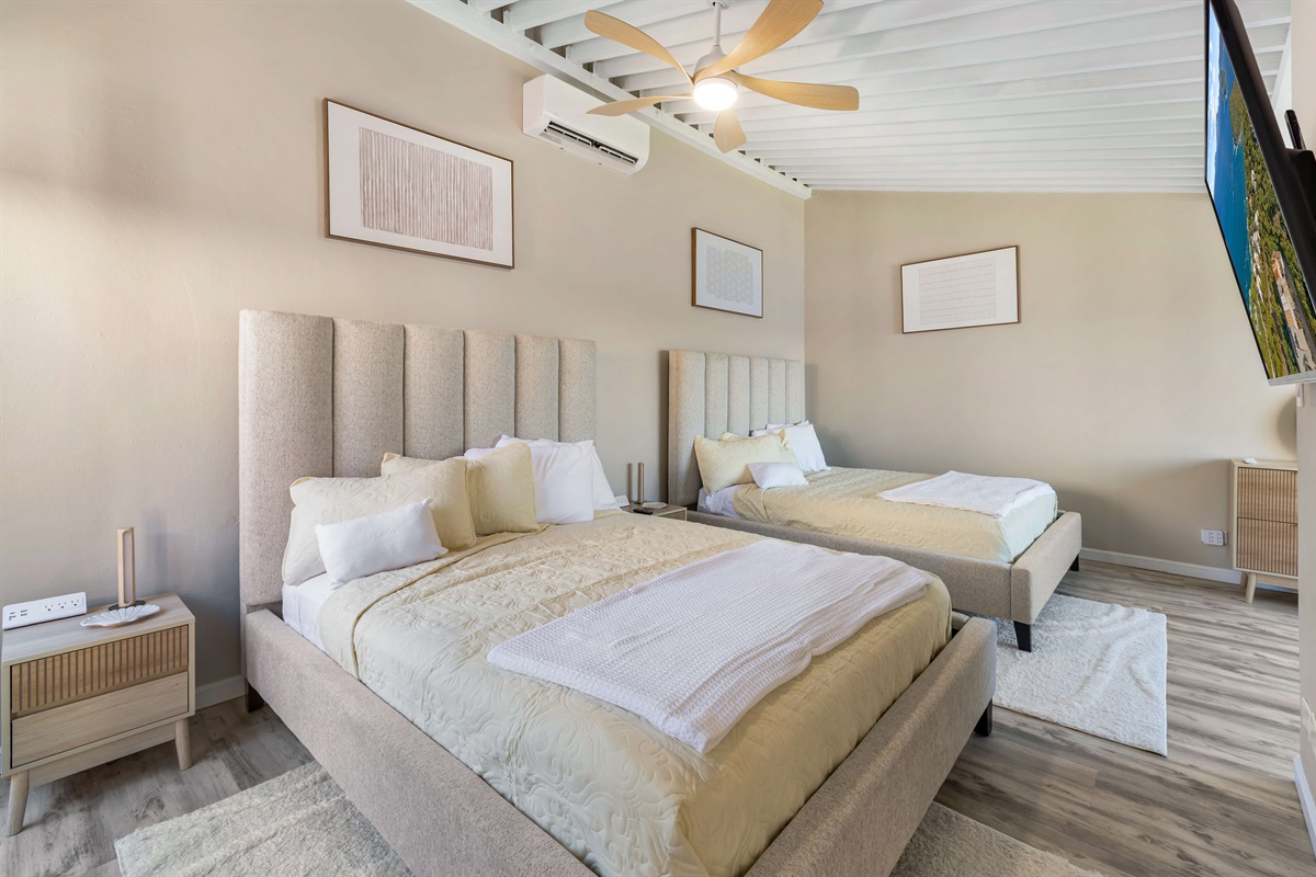 Guest bedroom with two queen beds