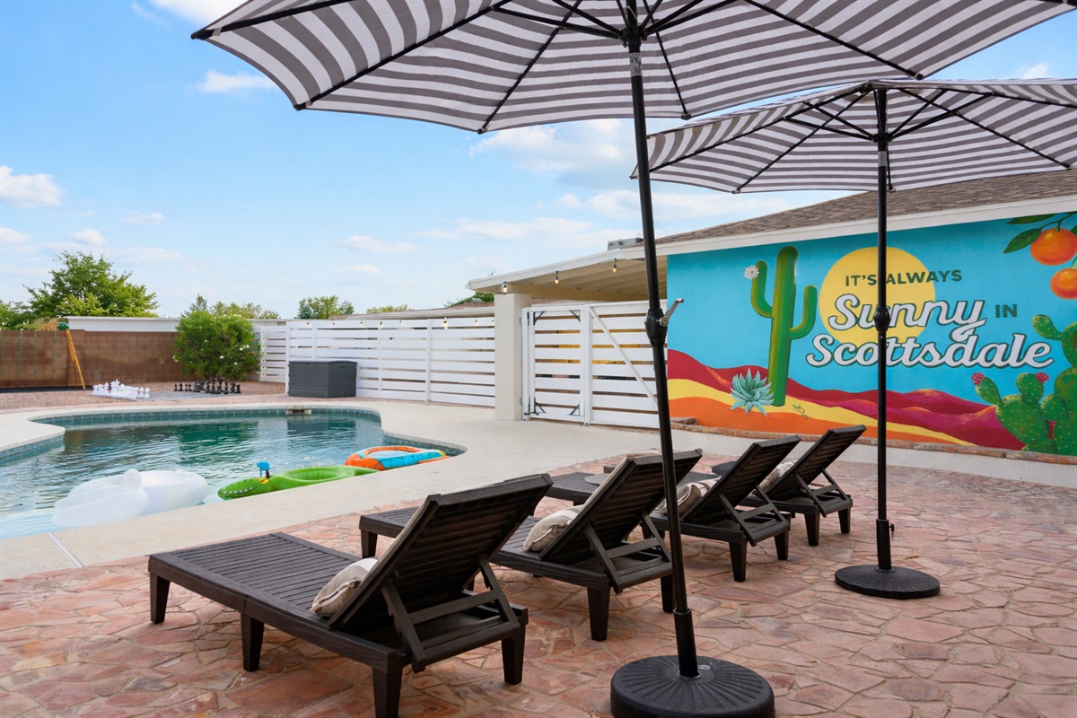 Relax and watch others splash and splash in the large pool!